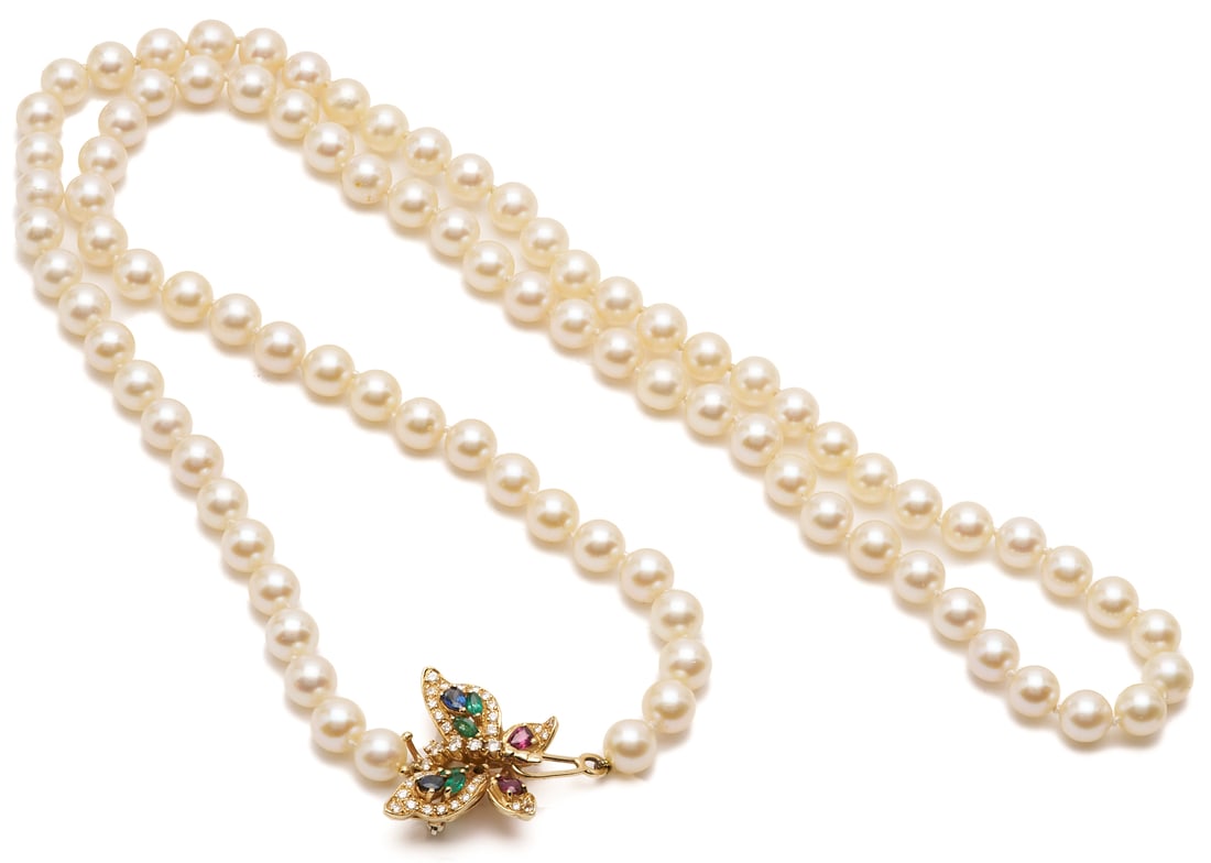 Pearl Necklace w/ 14K Gold & Gemstone Butterfly Clasp: Ladies' pearl necklace featuring eighty-eight (88) cultured pearls approximately 8mm each with a 14K yellow gold butterfly clasp encrusted by forty-two (42) round brilliant cut melee diamonds, fou