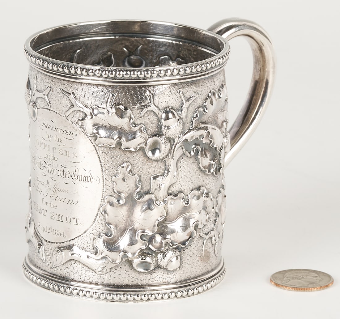 Coin Silver Presentation Cup, U.S. President's Mounted Guard: American coin silver repousse cup or mug with militaria inscription: PRESENTED BY THE OFFICERS OF THE PRESIDENT'S MOUNTED GUARD TO QUARTERMASTER JOHN T.(?) EVANS FOR THE BEST SHOT,