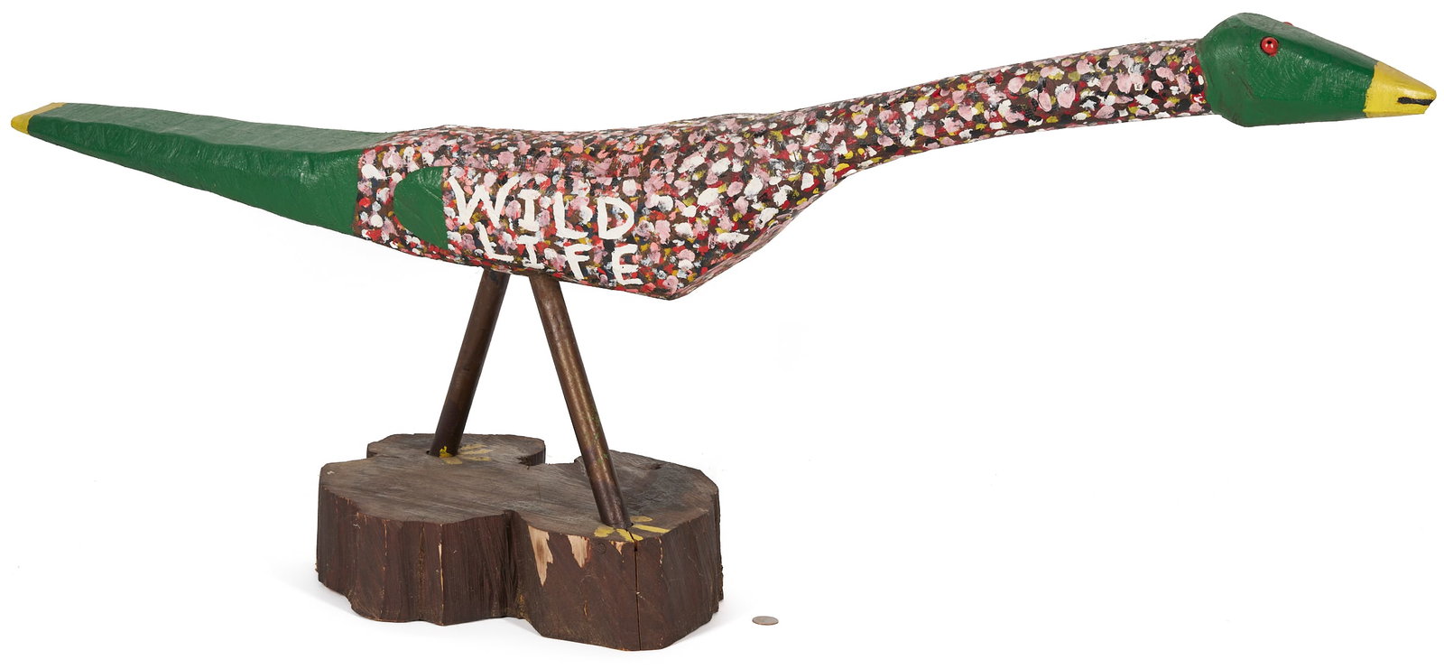 J.L. Nipper Painted & Carved Turkey, Wild Life: J.L. Nipper (Tennessee, 1935-2021) carved and polychrome painted bird figure with painted marble eyes, the wings with painted title "Wild Life" on each side, and two legs inserted into a hew