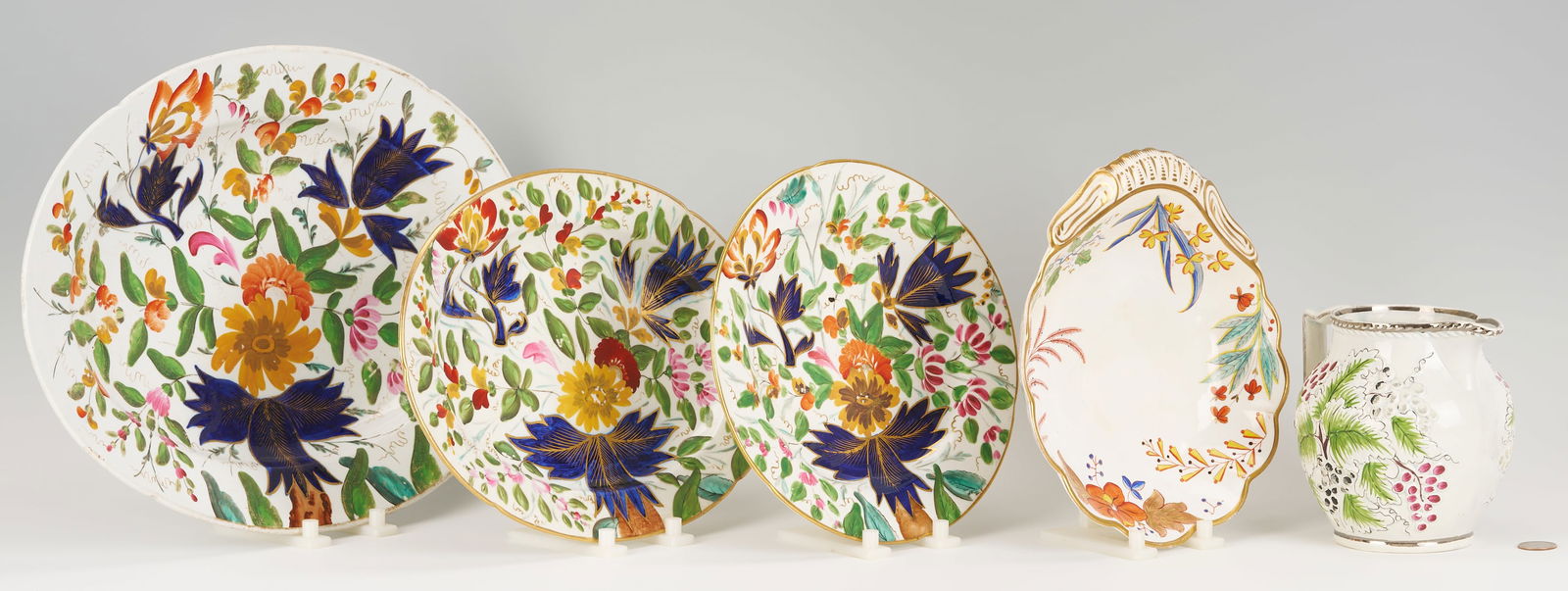 5 19th C. English Porcelain Items: Spode and Coalport: Five (5) English porcelain items, including 2 Coalport platters and 1 Coalport plate having shaped rims and polychrome with gilt floral decoration; 1 relief molded pitcher with leaf and