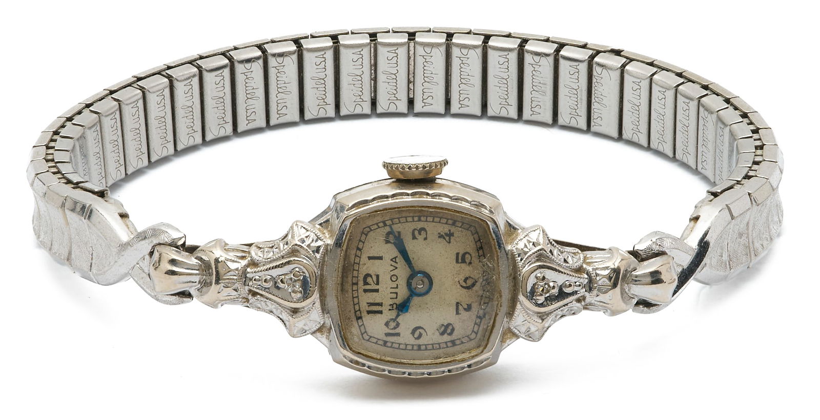 14K Gold Bulova Wrist Watch: 14K white gold Bulova 21 jewel wrist watch featuring two (2) single cut melee diamonds. The case is marked "14K Gold Bulova" and XRF tests 14K gold. The band is base metal. The watch has a 6