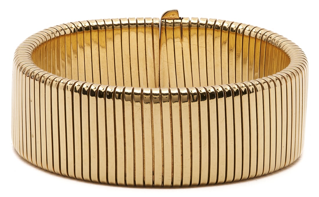 Tiffany & Co 14K Gold Tubogas Bracelet: Vintage Tiffany & Company 14K yellow gold tubogas style bracelet. Marked Tiffany & Co. and "14K" on the clasp. XRF tests 14K. 6 1/2 in. L x 3/4 in. W. 60.9 grams. Additional