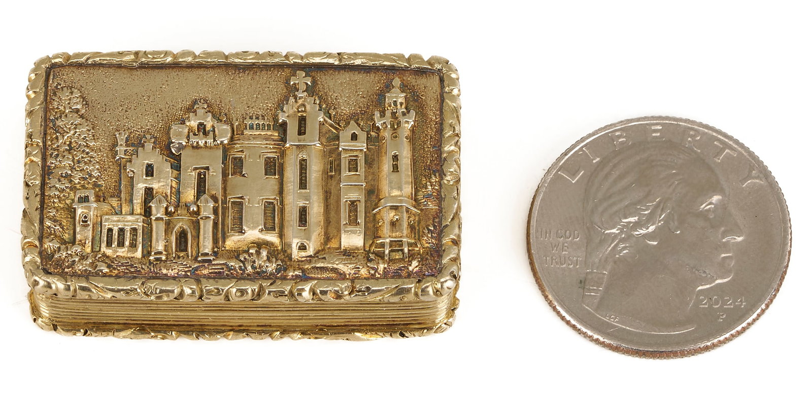 English Sterling Silver Castle Top Vinaigrette, 1833: William IV gilt sterling silver "Castle Top" vinaigrette of rectangular form, depicting Abbottsford, the home of Sir Walter Scott (1771-1832), in high reserve to one side, and engine turned 