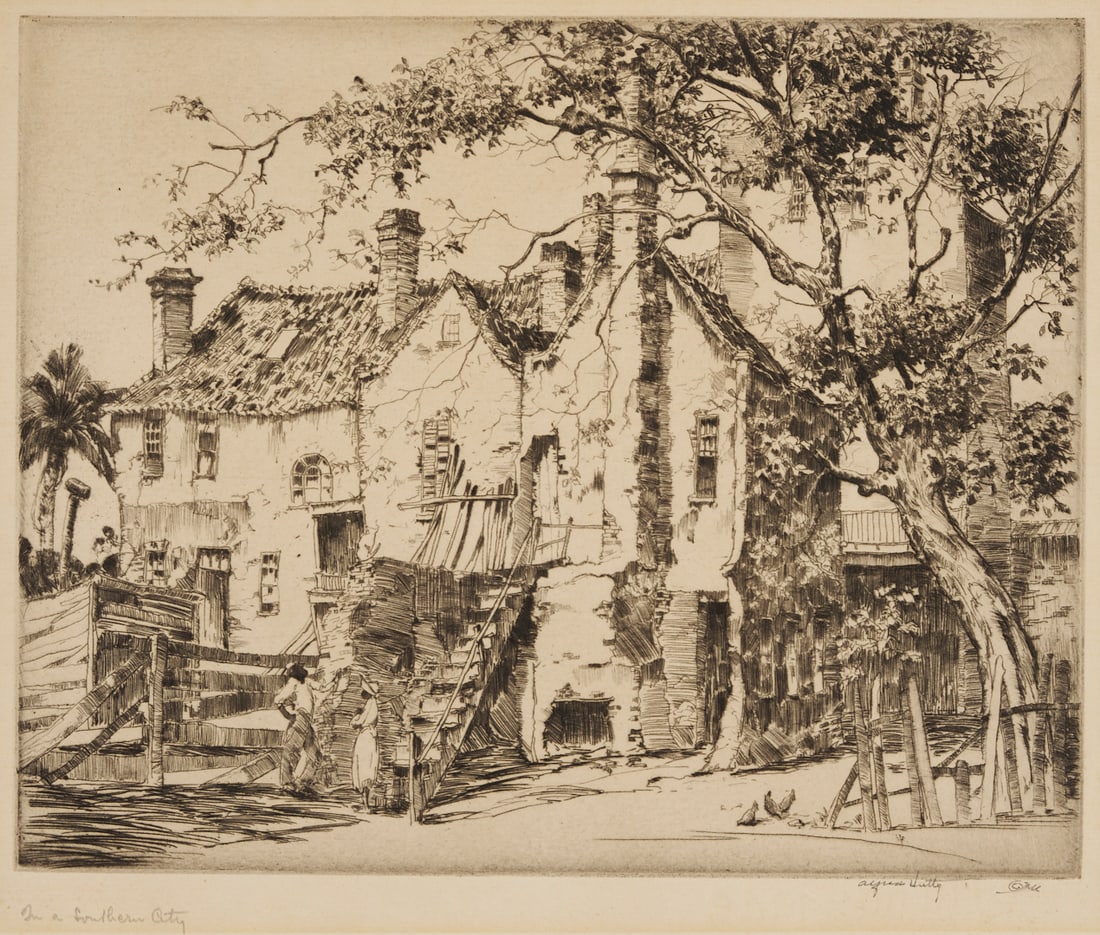 Alfred Hutty Signed Etching, In A Southern City, 1929: Alfred Heber Hutty (Charleston, South Carolina, 1877-1954) etching titled “In A Southern City.” Two African-American figures converse behind a dilapidated building, with a l