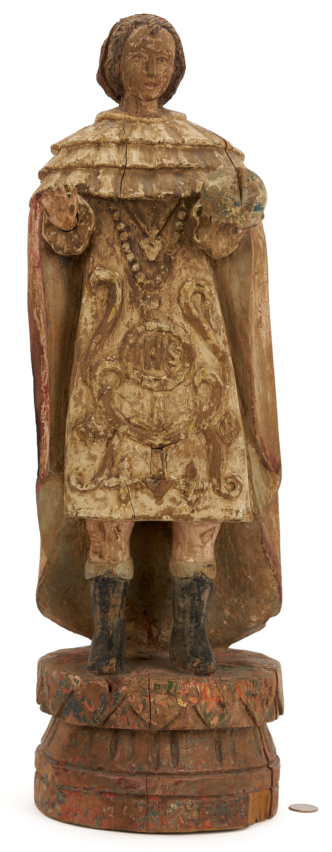 Spanish Colonial Philippines Santos Figure, Jesus of Prague: A large Spanish Colonial Philippines carved and polychrome-painted Santos of Jesus of Prague. Depicting a young Jesus holding an orb or the world in his left hand with his right hand held upright, wea