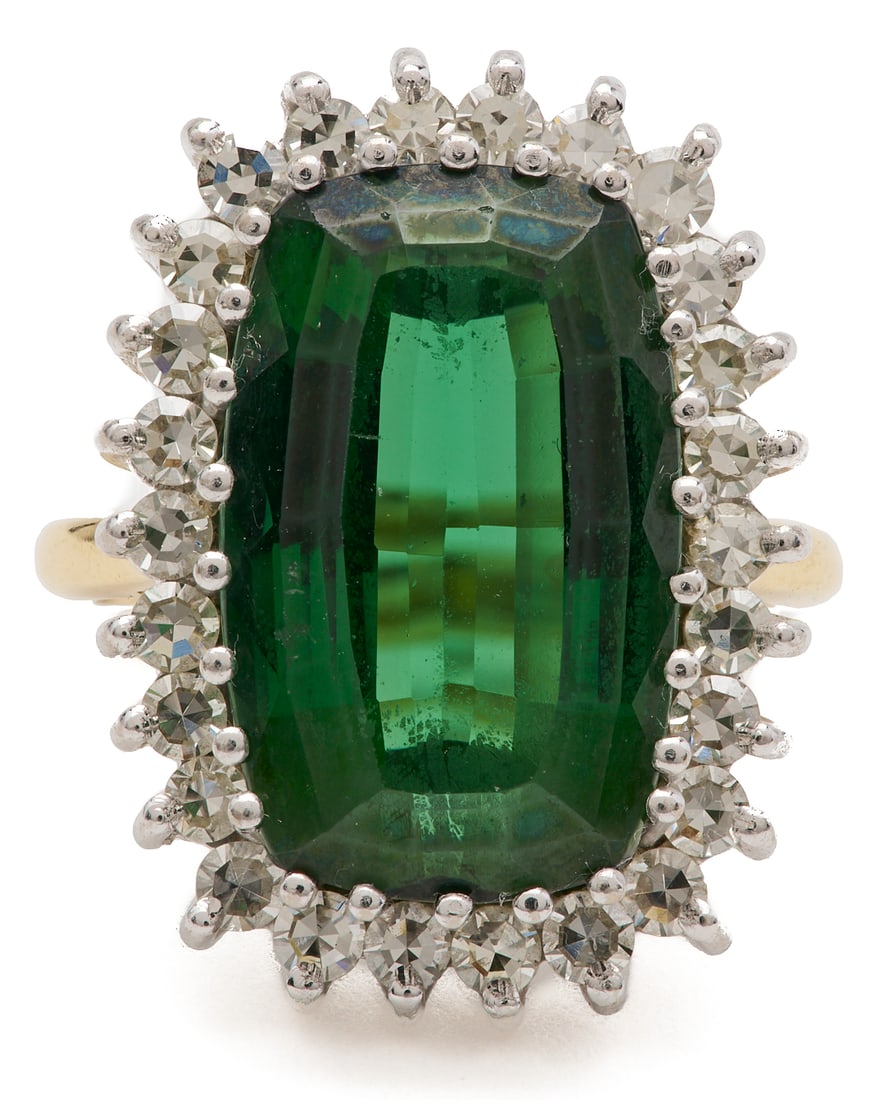 18K White and Yellow Gold Green Tourmaline and Diamond Ring: 18K white and yellow gold green tourmaline and diamond ring featuring one (1) rectangular cushion-cut green tourmaline measuring approximately 11 x 18 mm, with an estimated total weight of approximate
