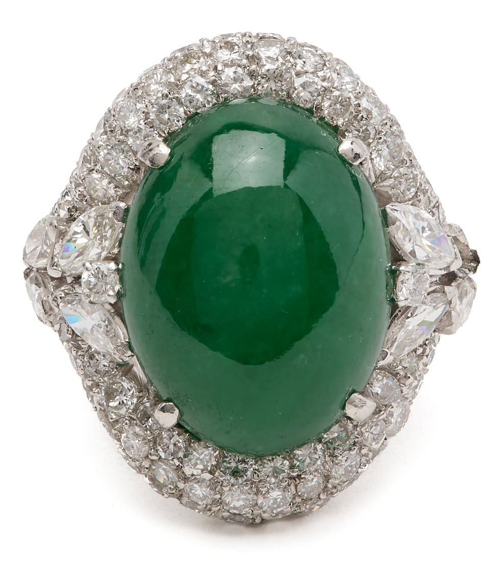 Platinum Jade & Diamond Ring: Platinum jade and diamond ring featuring one (1) oval jade cabochon measuring approximately 18 x 13 mm, suspected treated, and diamonds, approximately 3.00 carats total weight. Marked "Trio"