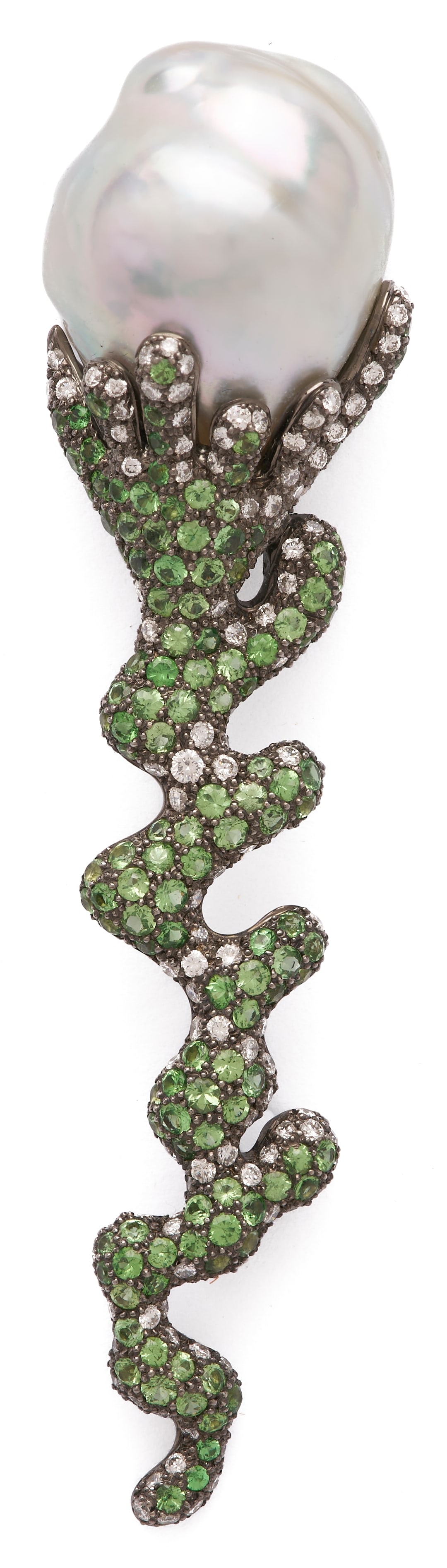 18K South Sea Pearl, Diamond, & Tsavorite Garnet Bar Pin: 18K white gold bar pin featuring an extra-large baroque South Sea pearl measuring approximately 24 x 19 mm, accented by pave-set diamonds and tsavorite garnets with a black rhodium finish. Containing 