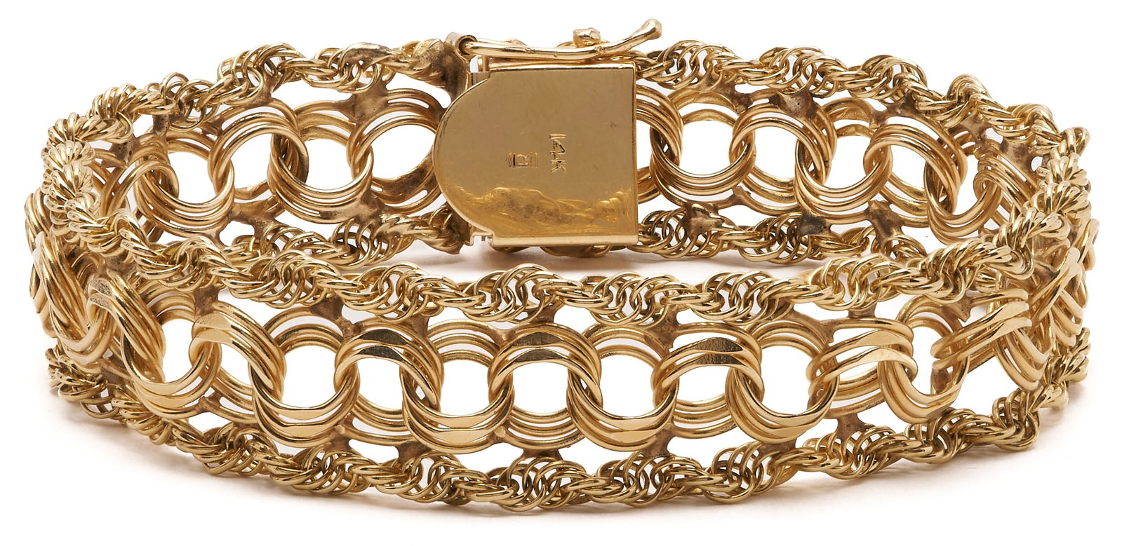14K Yellow Gold Triple Strand Bracelet: Vintage 14K yellow gold triple-strand bracelet with central circular links, flanked by loose rope-twist chains. The bracelet is marked 14K and XRF tests 14K. 8 1/8 in. L. 21 grams. Additional high-res