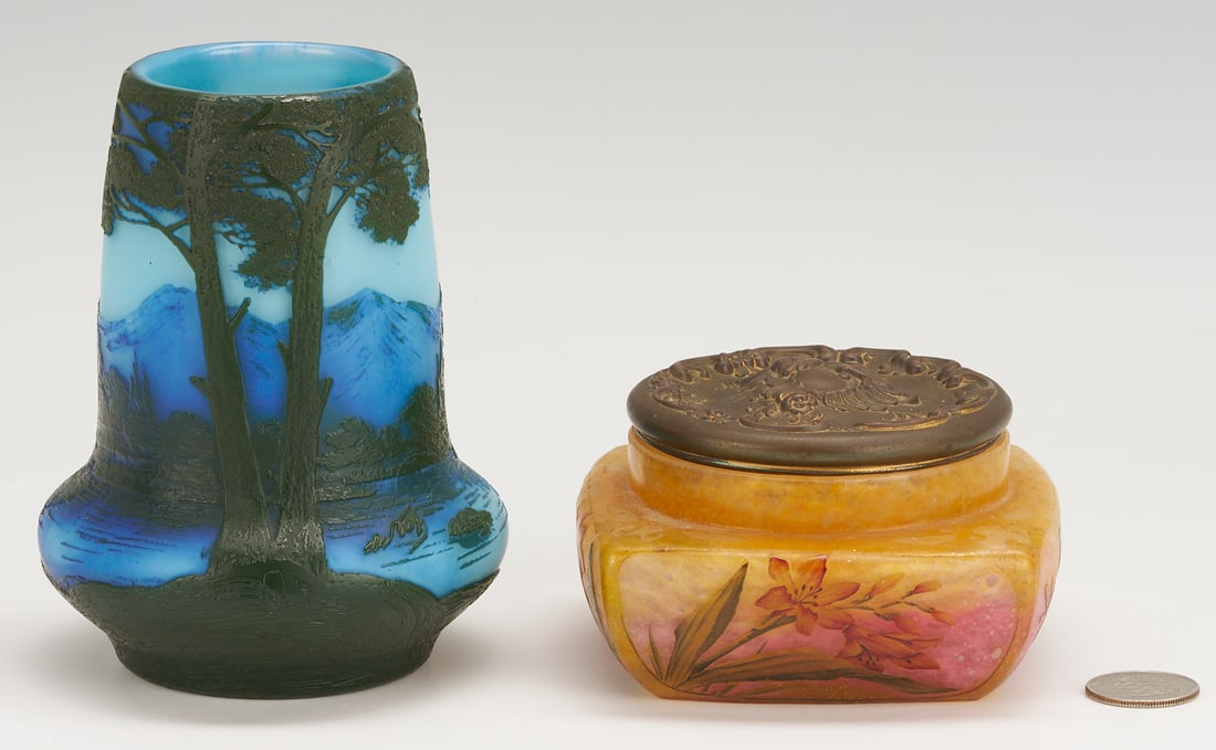 2 French Art Nouveau Art Glass items, Daum Nancy & DeVez Vase: 1st item: Daum Nancy signed cameo glass powder jar with carved and hand-painted floral decoration on a mottled orange background and a repousse metal lid (not marked). 2 1/2 in. H x 4 in. square. 2nd 