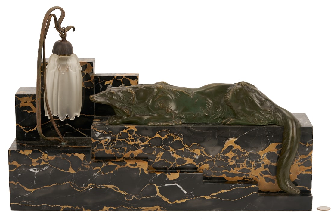 Art Deco Marble & Bronze Desk Lamp: French Art Deco figural desk lamp consisting of stacked variegated black marble featuring a sculpture of a reclining bronze dog and a bronze lamp with a frosted glass shade. Back leg of the