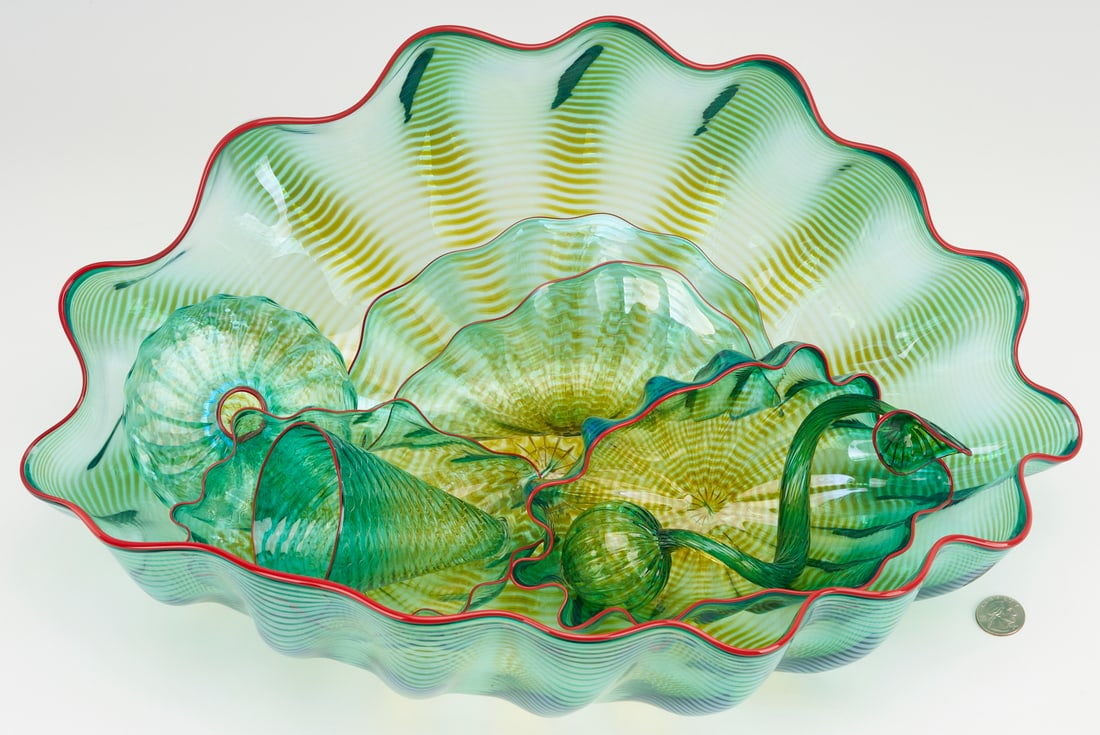 Dale Chihuly Clover Green Seaform Set, 2001, 7 pcs: Dale Chihuly (American, b.1941) art glass sculpture, Clover Green Seaform Set with Carmine Lip Wraps. Seven pieces of graduated sizes and in various forms feature striped green