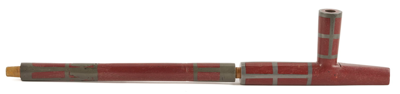 Native American Sioux Catlinite Pipe w/ Pewter Inlay: A Native American Sioux red catlinite pipe with pewter inlay. Wooden connector and stem. 16 in. length. Circa 1900. Additional high-resolution photos and a list of recommended shippers are available