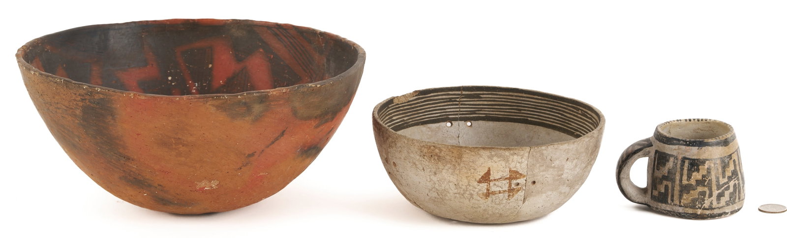 3 Native American Prehistoric Pottery Items: 1st item: Anasazi pottery mug with a black geometric pattern around the sides and handle. Old Norman and Marie Horn receipt from Great Bend, KS, with a note stating "the mug was dug in 72. The