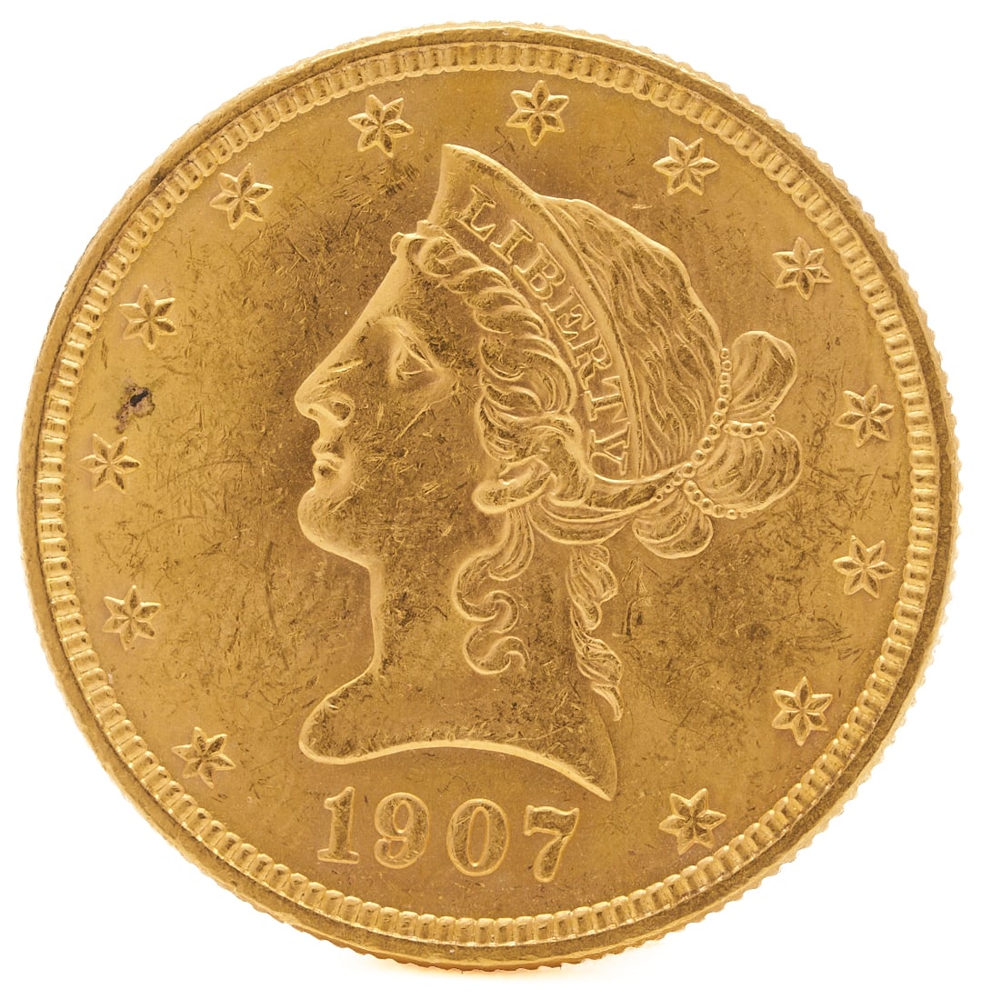 1907 Philadelphia $10 Liberty Head Gold Coin: 1907 Philadelphia Liberty Head Gold Coin, designed by Christian Gobrecht, features a classical profile of Lady Liberty facing left. 90% gold content; XRF tests 90.% gold. 27 mm and weighs 16.7 g