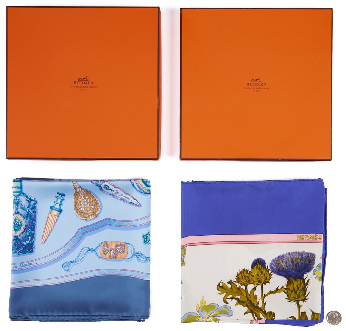 2 Hermes Silk Twill Scarves: Regina & Les Flacons: 1st item: Hermes silk twill scarf, Regina, designed by Leïla Menchari in 1972 to honor Her Majesty, Queen Elizabeth II. Featuring a floral bouquet on a white ground with a periwinkle blue border.