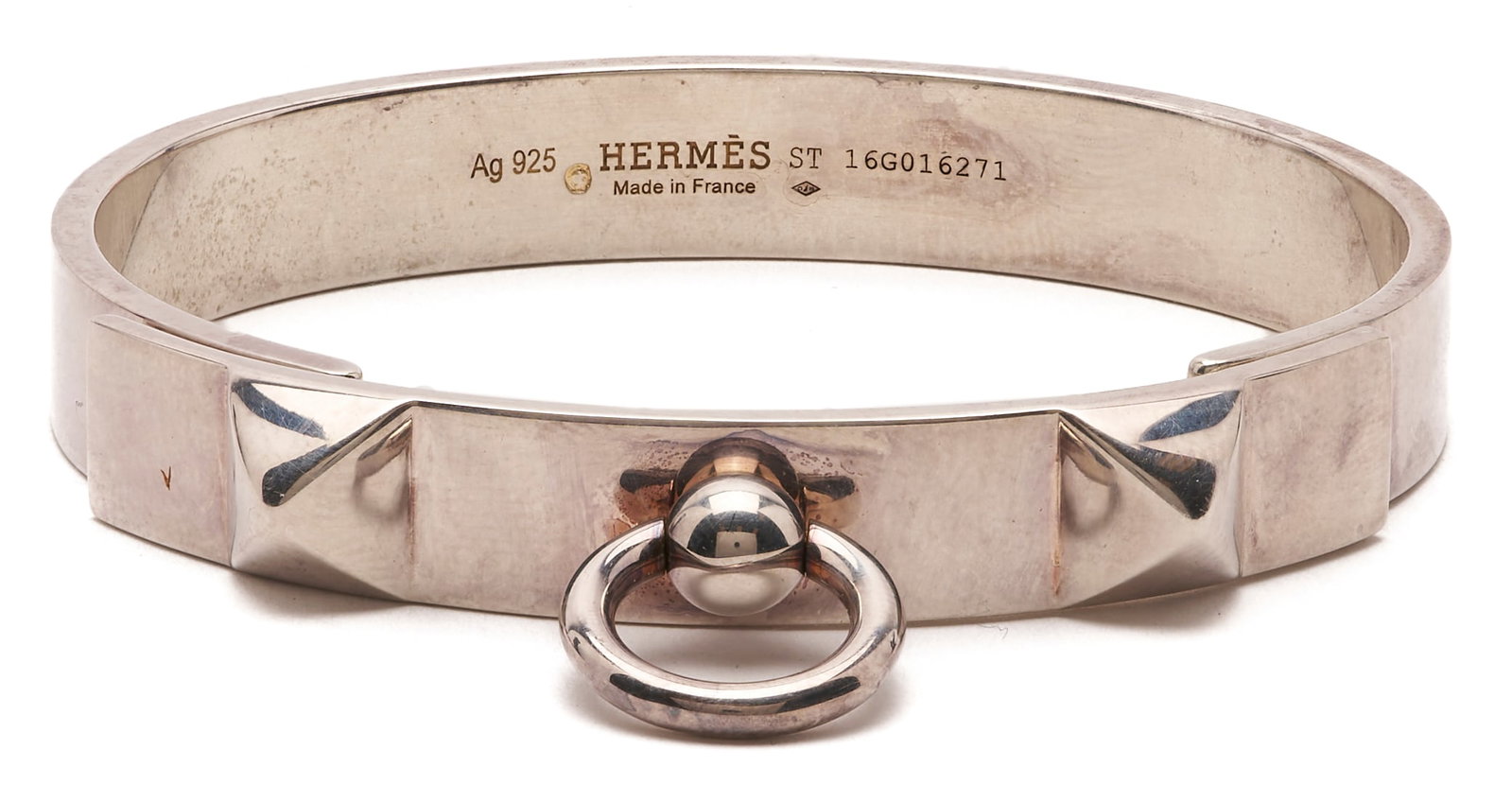 Hermes Sterling CDC Collier de Chien Bracelet:  Hermes sterling silver CDC Collier de Chien bangle bracelet, hinged front with studs and ring. Marked Ag925 HERMES ST 16G016271 MADE IN FRANCE. Retains the original box. Additional high-re