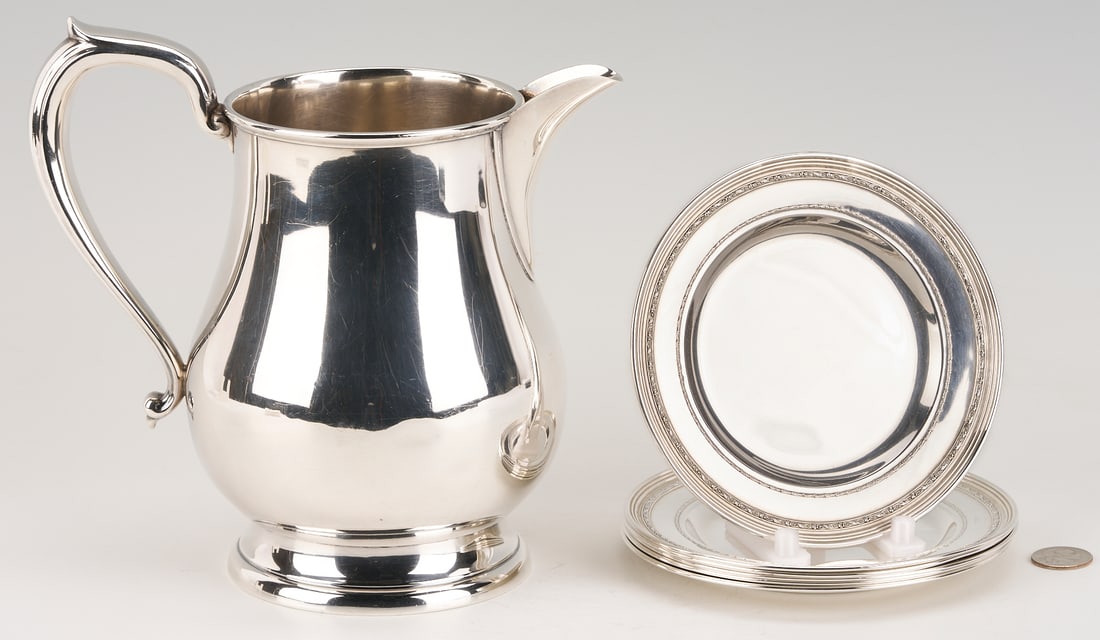 Kirk Sterling Pitcher plus 6 International Sterling Bread Plates: S. Kirk & Son sterling silver water pitcher, pear shaped form with C scroll handle and molded foot, stamped # 205, 8 1/2 in. H, 21.2 oz troy, together with six (6) International Sterling bread pla