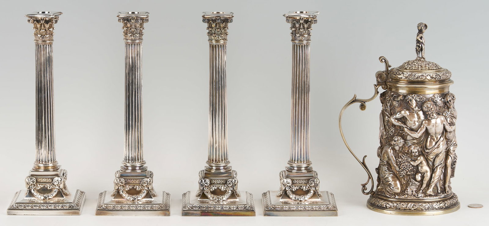 Elkington Electrotype Tankard plus 4 Candlesticks: Scarce Victorian Electrotype parcel gilt tankard by Elkington, Mason & Co., "from the original in ivory in the possession of Henry C.G. Bedford Esq." The tapering body features mythologi