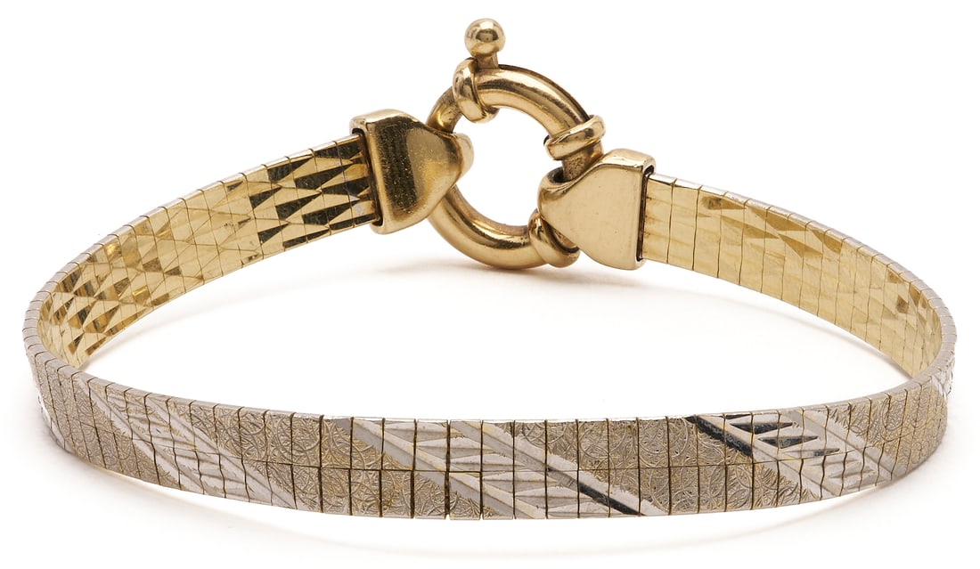 14K Two-Tone Italian Reversible Bracelet: Italian 14K yellow gold reversible bracelet with textured white gold on the reverse side. Marked "14Kt Italy" and XRF tests 14K. 7.5" L and 6mm W. 16.05 grams. Additional