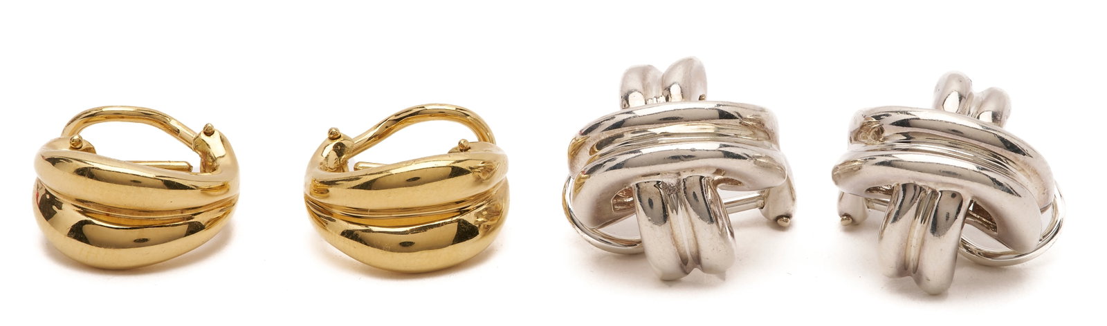 2 Prs. Tiffany & Co. Earrings, w/ Original Bags & Boxes: 1st item: Pair of Tiffany & Co. 18K yellow gold small omega-wire shrimp huggies, marked "750, Italy, and Tiffany & Co." 7.16 grams. 2nd item: Pair of sterling silver signature