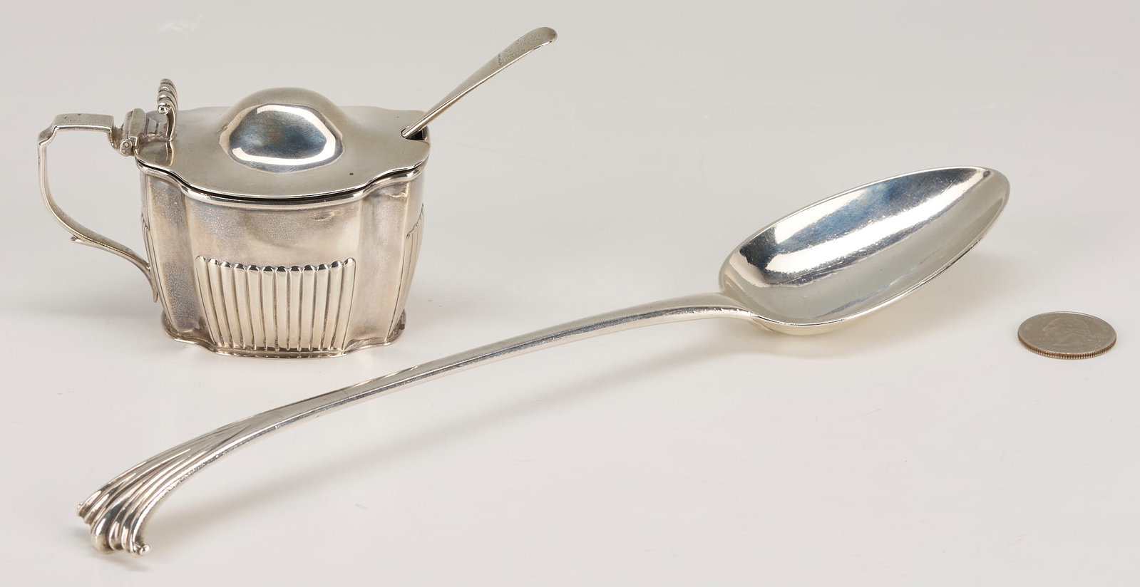 1771 English Sterling Basting Spoon plus Mustard Pot w/ Sterling Silver Spoon: 3 pieces English sterling silver. Item 1: English sterling silver basting or stuffing spoon in the Onsolow pattern by Stephen Adam I, working in London (1760-1802), date letter for 1771. 10 5/8 
