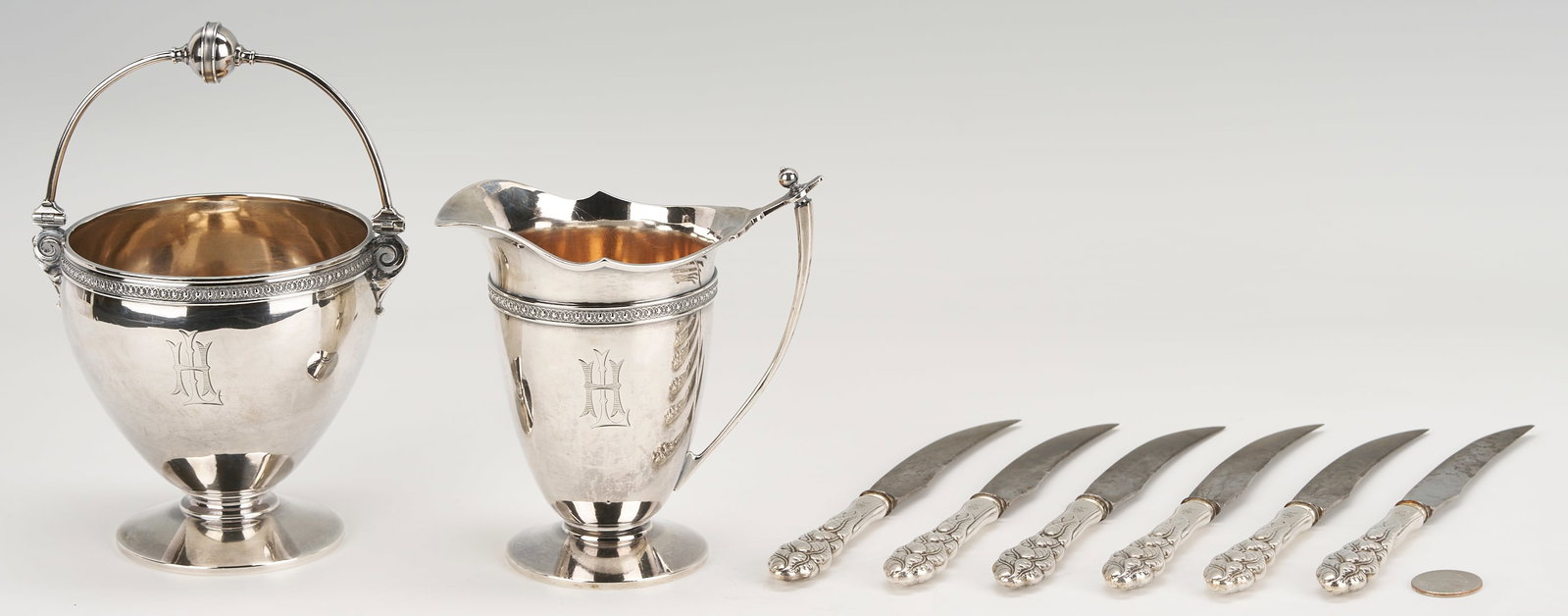 8 Early Tiffany & Co Sterling Pcs., incl. Sugar and Cream Jug: 1st & 2nd items: Tiffany and Co. Aesthetic Movement sterling silver creamer and sugar bowl. Each piece marked TIFFANY & CO / NEW YORK / 925 STERLING / 36. Height: 5 in. and 5 1/2