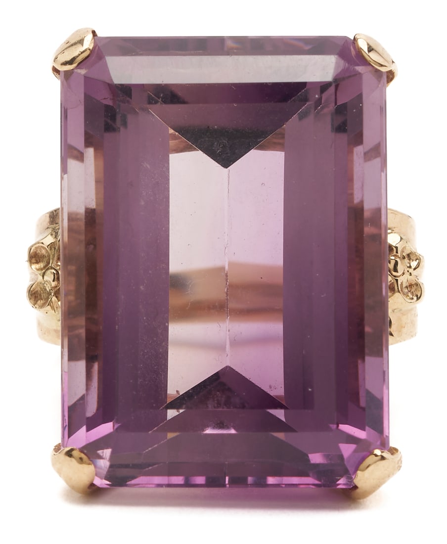 10K Yellow Gold 25 Carat Amethyst: Large 25-carat emerald-cut amethyst ring set in 10K yellow gold, featuring a substantial step-cut amethyst measuring approximately 21.92 x 15.64 x 11 mm, with an estimated weight of approximately