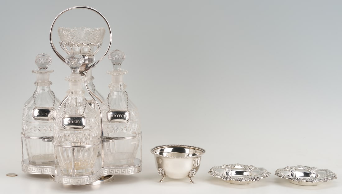 Old Sheffield Decanter Stand plus 3 small sterling bowls: 1st item: Silver plated revolving liquor or cocktail stand with crystal decanters. Four leaf clover shape frame with Greek key banding and miniature urn at center, which conceals a screw