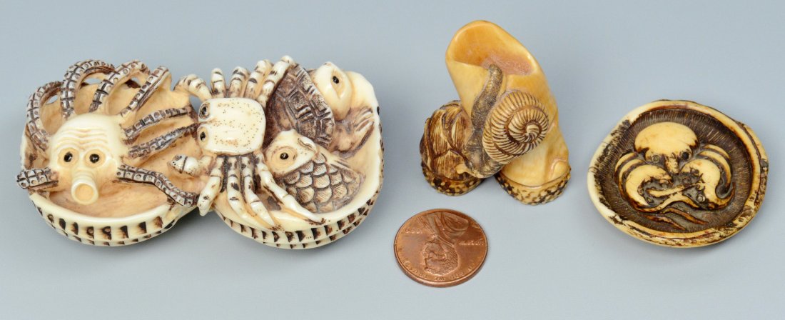 3 Carved Japanese Ivory Netsukes: Three carved Japanese ivory netsukes. 1st item: Carved and ink stained netsuke of clam shell and sea creatures including octopus, crab, fish and turtle, signed on base, 1" H x 3" W x 1-3/4" D. 2nd ite