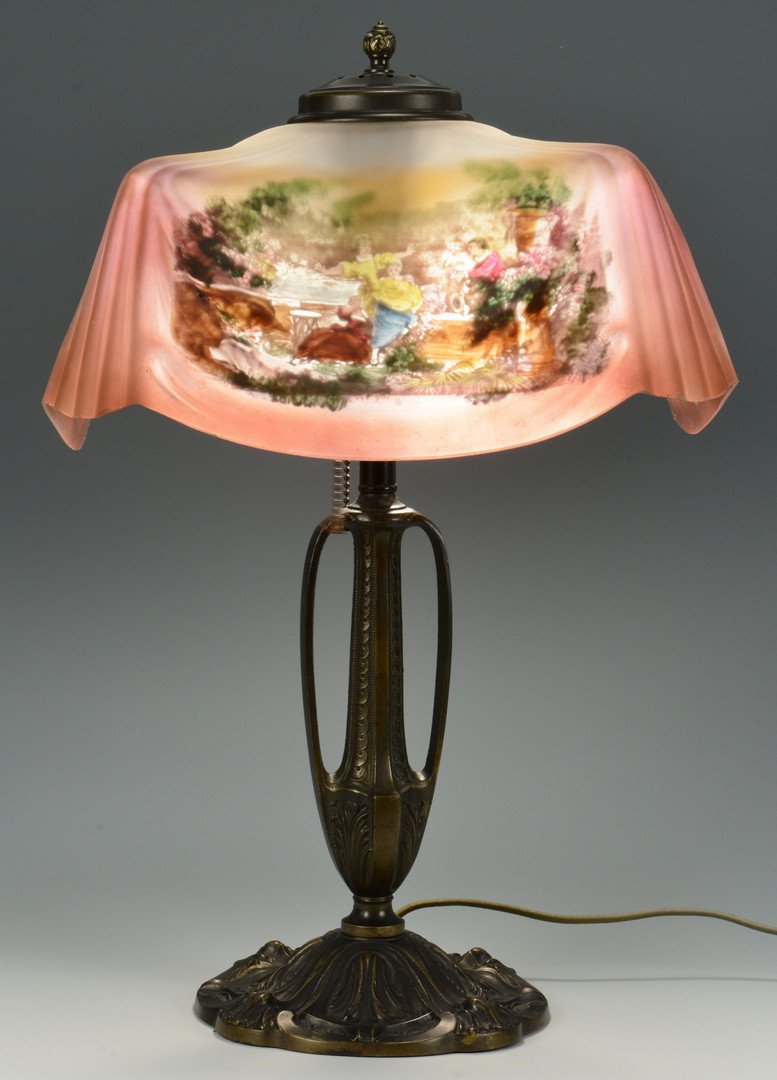 Pittsburgh Reverse Painted Lamp: Pittsburgh reverse painted table lamp with frosted glass shade in drapery design and having four reverse painted scenes of courting figures in garden settings. The 2-socket lamp base is in Art Nouveau