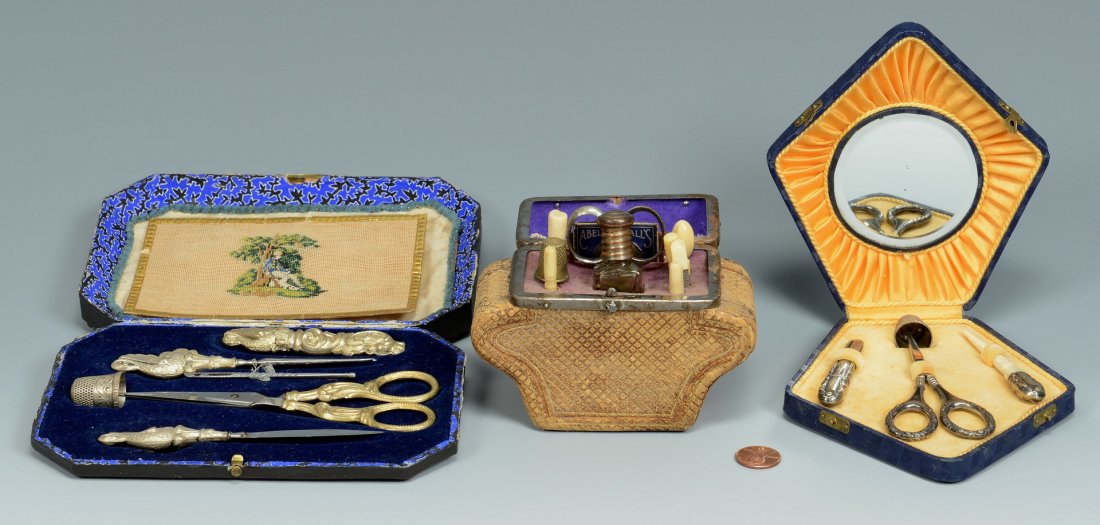 3 Sewing Necessaires: Lot of 3 Continental Sewing Necessaire boxes with contents. 1st item: Palais Royale style leather case with carved Rococo style wood trim and applied lithographed paper portrait of an 18th century bea