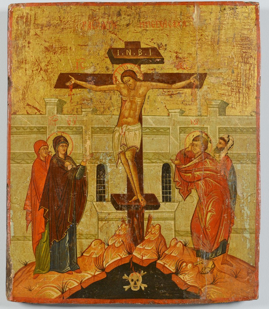 Russian Icon of the Crucifixion: Russian religious icon, tempera on wood panel, depicting Jesus Christ's crucifixion on the cross at Golgatha (Place of the Skull); His mother the Virgin Mary and disciple St. John at His sides and a s