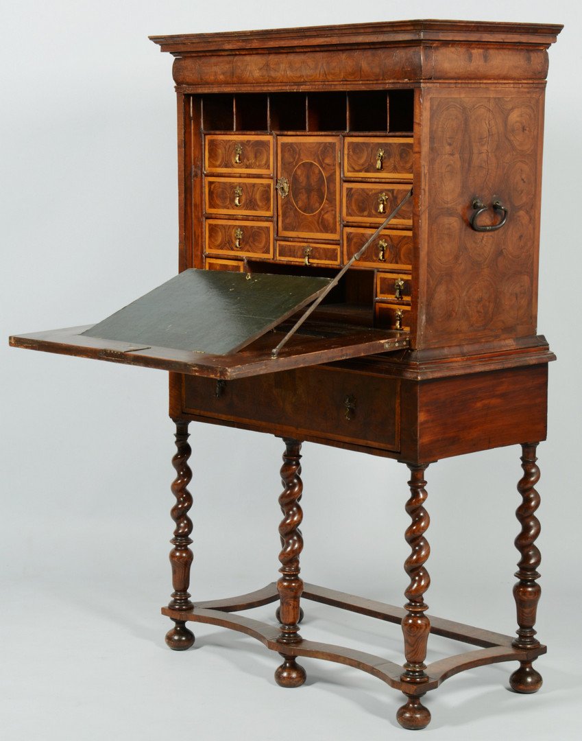 Oyster Burl Desk on Frame: Oyster burl marquetry desk on stand with lightwood inlay borders, ogee cornice with frieze concealing a long convex drawer over a fall-front with hinged inset writing surface. Interior of desk with a 