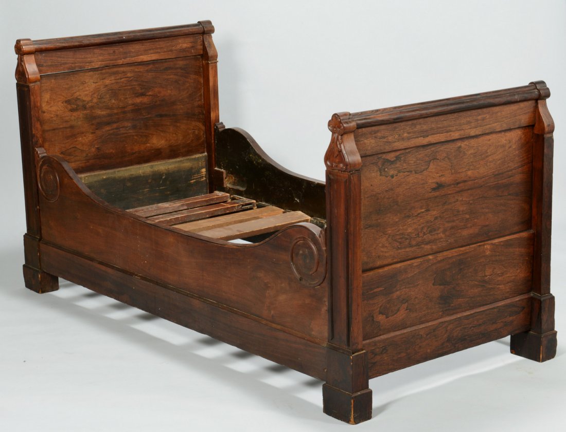 Gothic Rosewood Sleigh Bed, c. 1840: American Gothic Revival rosewood sleigh bed, twin size. Shaped trefoil or spade post finials with carved shells and foliate leaves, paneled headboard and footboard, shaped side supports. Circa 1840. 3
