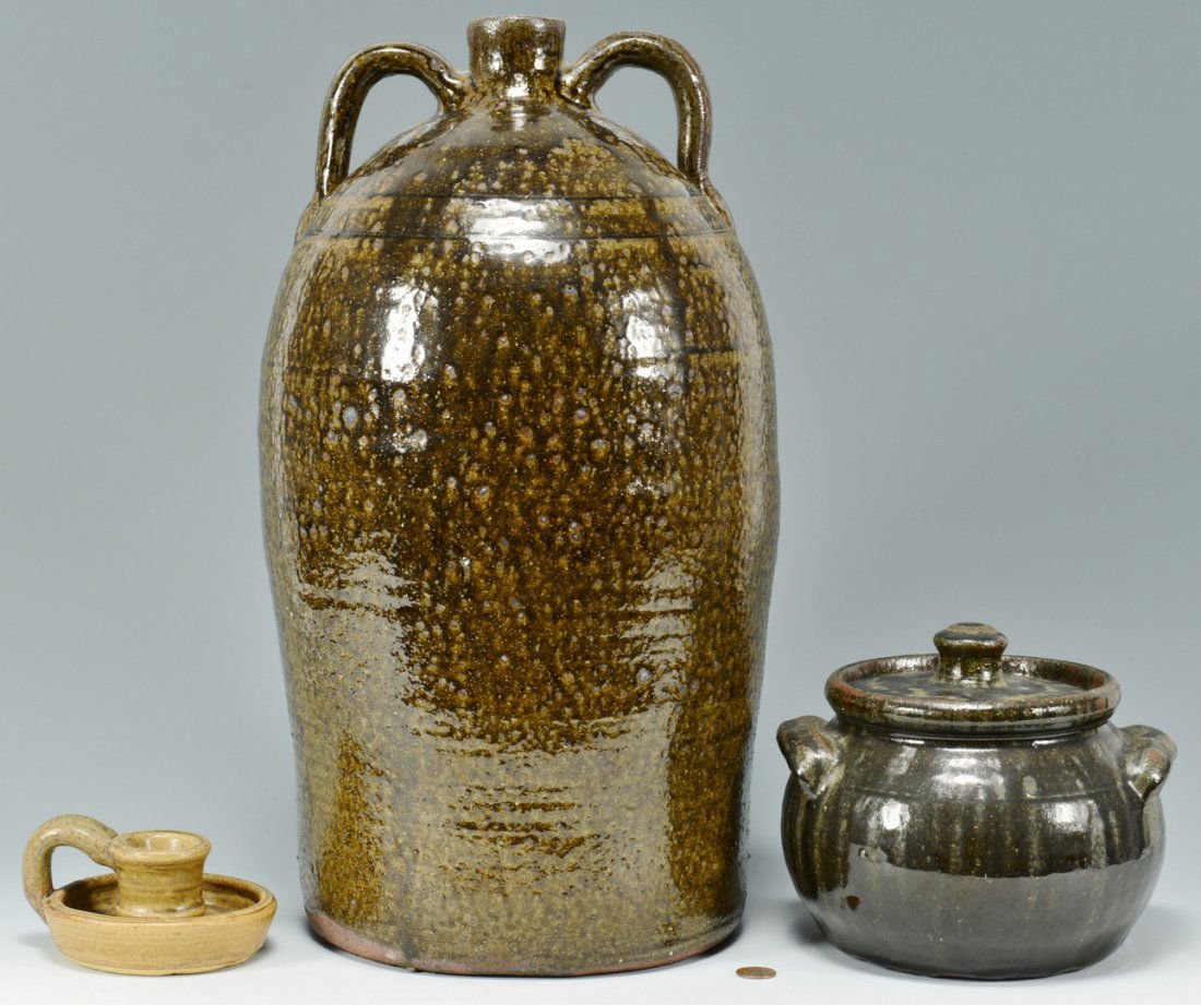 Lanier Meaders Folk Pottery: Group of Lanier Meaders folk art pottery, all signed on base, including one large green alkaline glazed two-handled jug in bulbous form, 17" H; one small green drip glazed chamberstick, inscribed on b