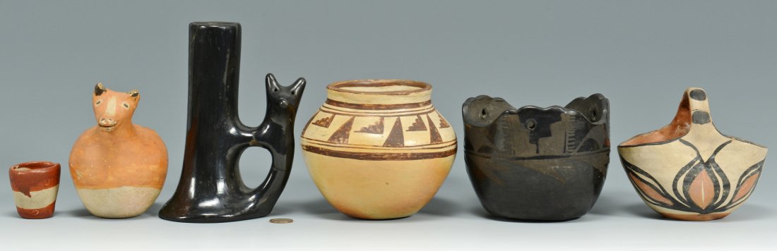 Southwestern Indian Pottery, 6 items: Grouping of Southwestern Indian pottery items. 1st item - San Ildefonso black on black design hanging flowerpot vase form with shaped lobed shaped rim with three holes for rope, geometric matte design