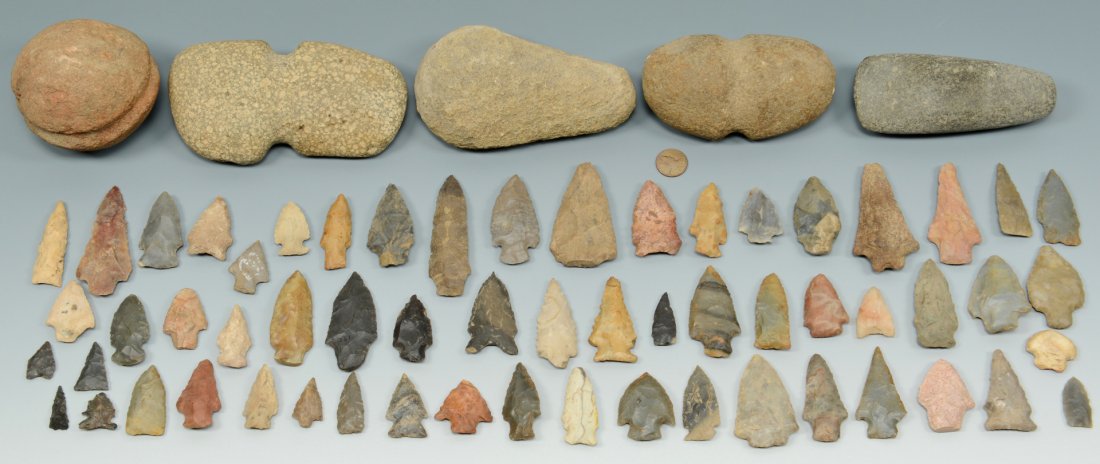 Native American axes, celts, points: Grouping of Native American axes, club stone, and arrow points. 1st grouping - Two stone ax heads, one appears to be granite. 5 1/2" and 4 1/2" length. 2nd grouping - Circular ax or club head. 3" diam