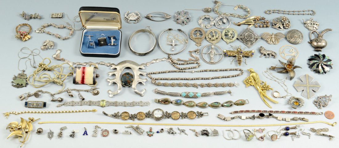 Large Group of Sterling Jewelry: Large group of mostly sterling silver jewelry by various makers including 1 Tiffany Paloma Picasso sterling cross pendant, 6 Scottish themed brooches including 1 hallmarked Edinburgh sterling, plus mi