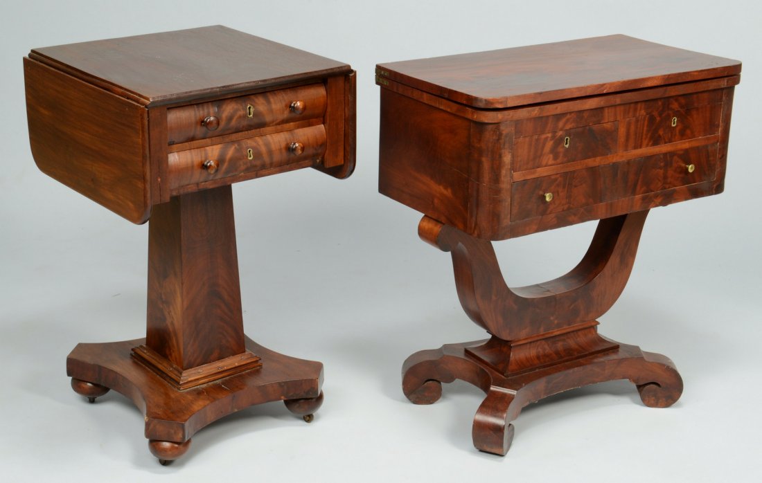 2 Empire Mahogany Tables, Work and Game: Two Empire mahogany tables. 1st item: Empire mahogany veneer drop leaf work table with two drawers, tapering block shaped support resting on a base with ball feet with casters, circa 1830, 20-3/8" H x