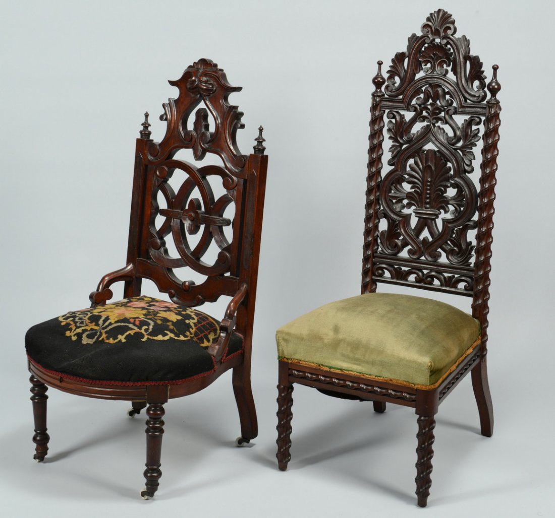 Two Gothic Revival Chairs: Two Victorian Gothic Revival mahogany chairs with pierced carved backs, one on casters with a needlepoint seat cover, the other with spiral turned stiles and legs. 41" H x 22" W x 19" D and 47" H x 18