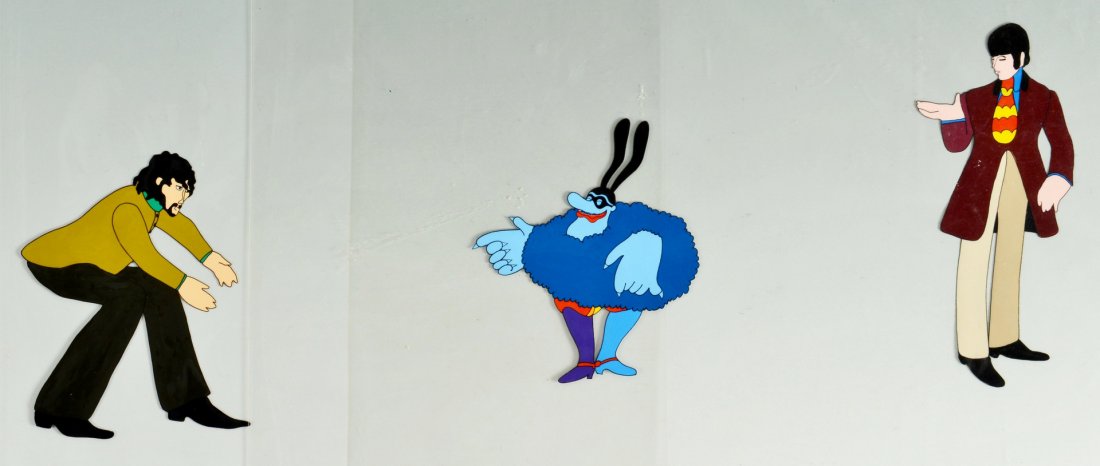 3 Yellow Submarine Animation Cels: Three original animation cels, gouache on celluoid, from the 1967 Beatles Yellow Submarine animation film including images of Paul McCartney, the Blue Meanie and George Harrison. 10-3/4" x 13-3/4" eac
