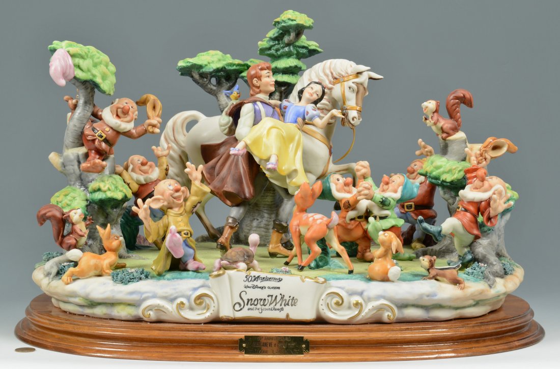 Capodimonte Snow White & Prince Figural: Laurenz Capodimonte limited edition 50th Anniversary porcelain figural of Snow White and Prince Charming, depicting Snow White being carried away by the prince surrounded by the celebrating seven dwar