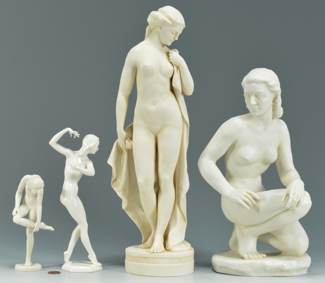 4 German Porcelain Nudes inc. Dresden: Grouping of four (4) German white porcelain nudes, three parian and one glazed. 1st grouping - Pair of large parian German female nudes, marked underside "Dresden". One nude female standing with a rob