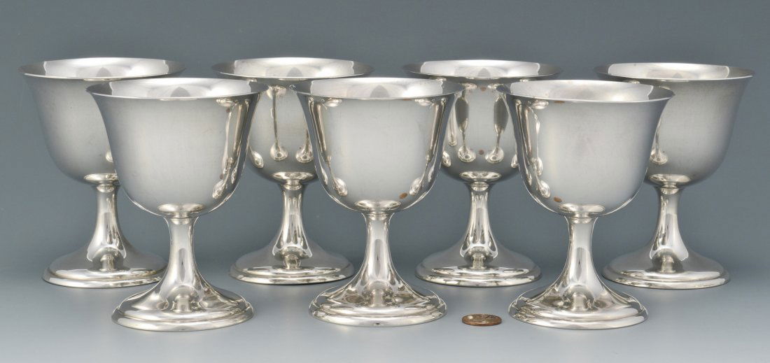 International Sterling Ice Cream Cups: Set of 7 International sterling silver ice cream cups, "Lord Saybrook, P120" incised underneath base. 4-3/8" H. No monograms. 21.615 total oz. troy. Provenance - Estate of Bill Selden, Athens, TN.
