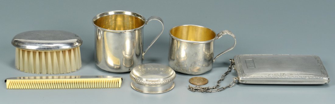 6 Article of Vanity Sterling Silver: Six articles of American sterling silver including lady's necessaire on chain; comb and brush; two sterling baby cups with gilt interiors and one monogrammed lid. All marked "sterling" and by various