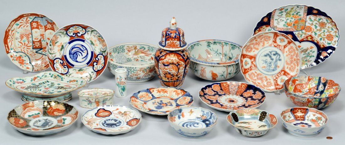 18 pcs Imari & Famille Rose: Large collection of Japanese and Chinese porcelain, mostly Imari with some Famille Rose. Imari includes: 1 covered ginger jar with ribbed body, 10"H (3" hairline and old rim chip to side of jar); 1 Im