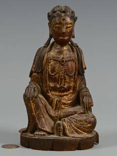 Polychrome Carved Seated Buddha: Asian polychrome and carved wooden Buddha depicted in a seated position. 6 1/4" H. Possibly Late 18th/Early 19th century.