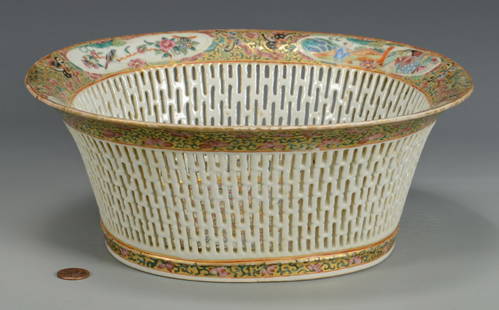 Famille Rose Butterfly Basket: Chinese Famille Rose basket, reticulated sides with borders decorated in alternating panels depicting Mandarin figures and birds and butterflies; gilt background with butterfly and floral motif.