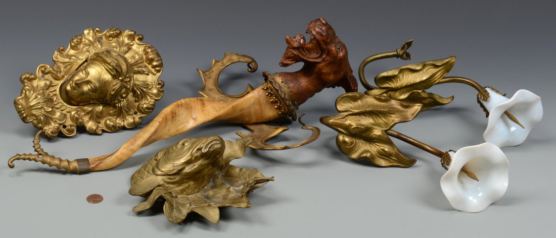 Carved Griffin & Decorative Brass: 5 decorative brass items. Includes a Black Forest style griffin or dragon with carved wood head and glass eyes, ram's horn body, and gilt metal wings and tail, 18"L; a pair of gilt brass foliate form 